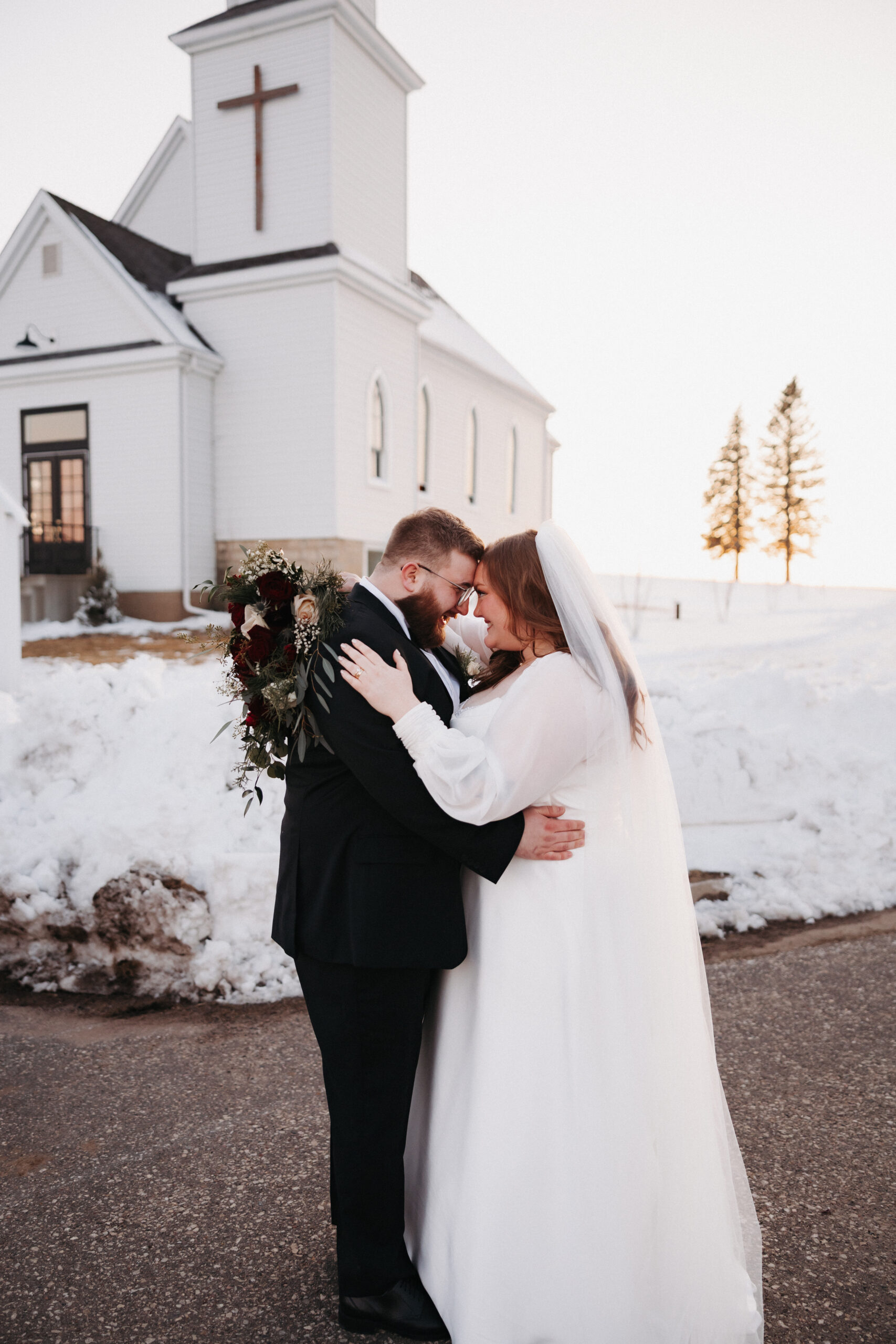 Gabi in Luxe Bridal gown walking down the aisle