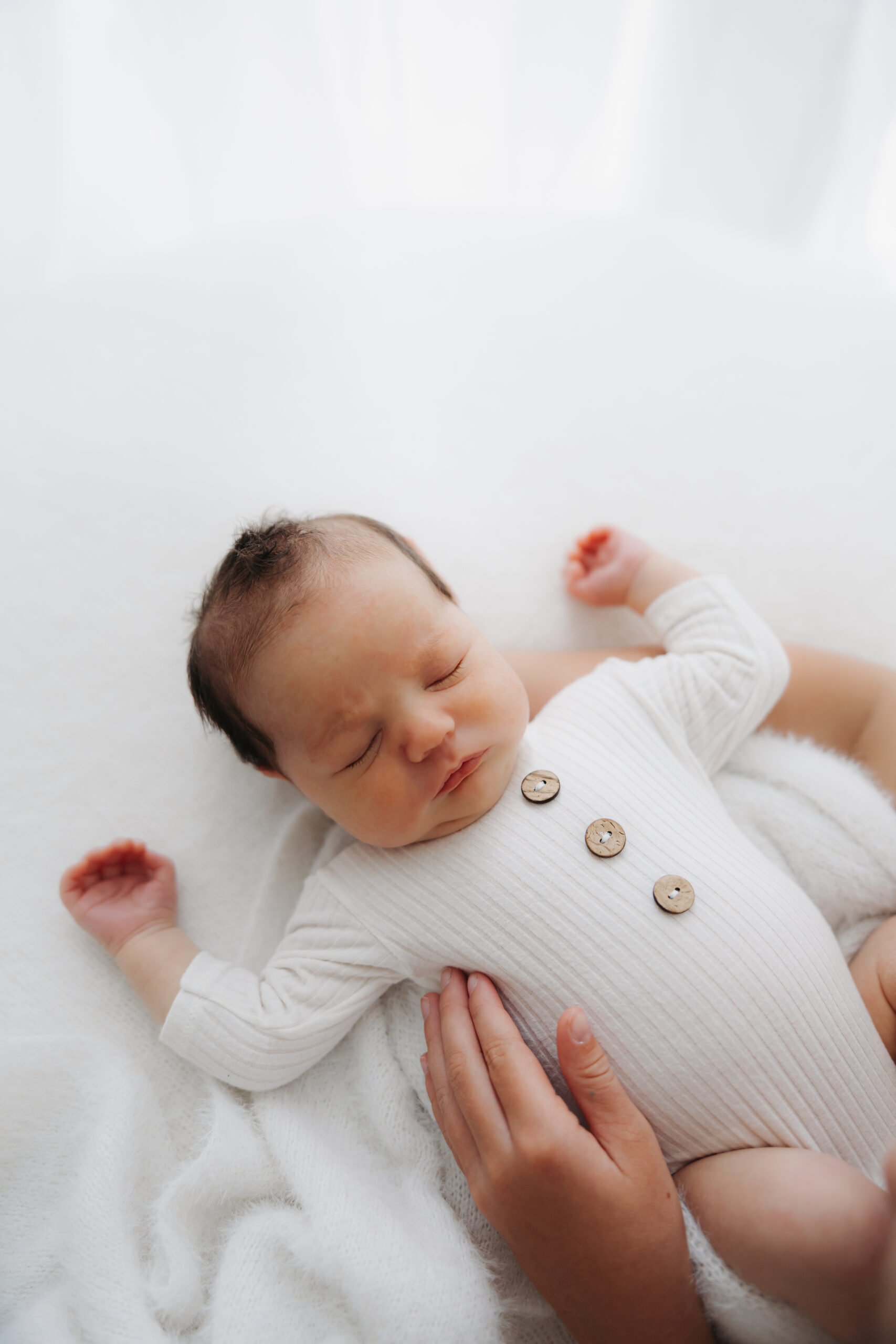 The Stage family newborn session at my new studio celebrates baby Axel, the sweet finale for this Christ-centered family of six.